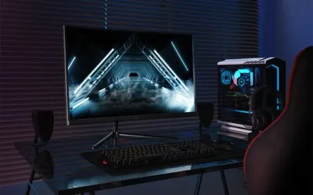 The Monoprice 32-inch ZERO-G curved gaming monitor is displayed on a desk.
