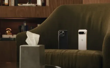 Google's talking pixel mascot stands next to an iPhone to represent the arrival of RCS on iOS 18.