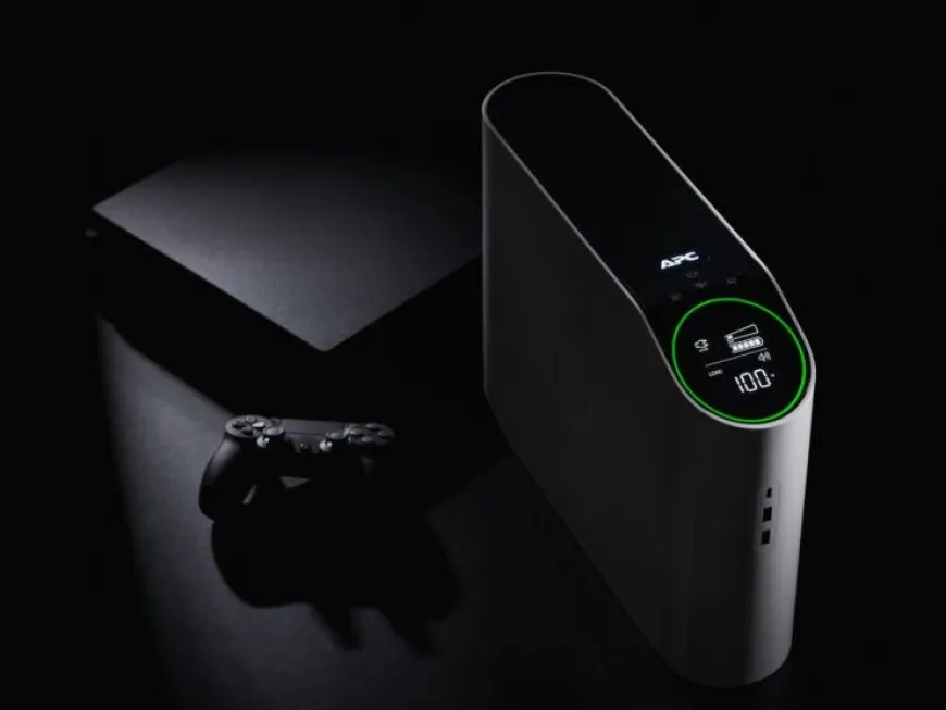 This device is a gaming-focused uninterruptible power supply featuring multiple outlets and indicator lights.