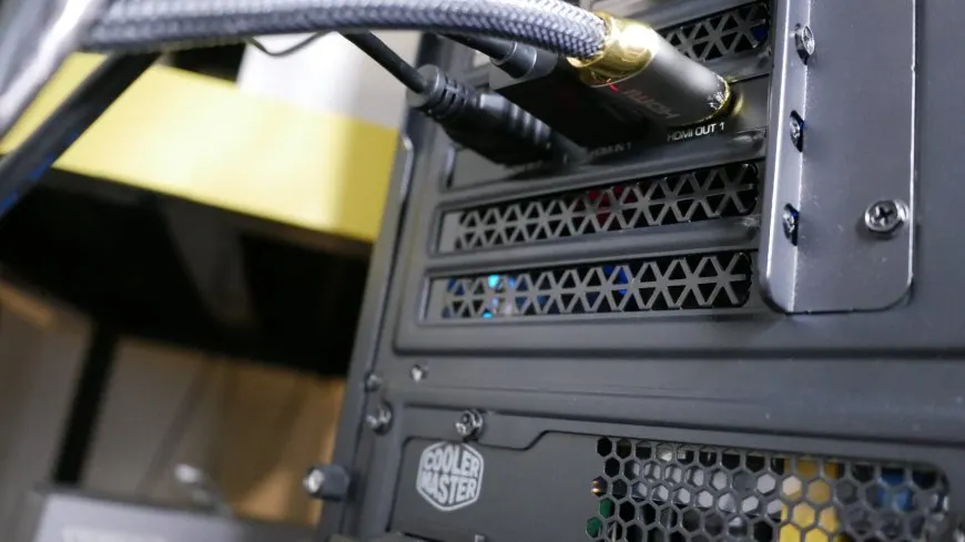 The black AVerMedia Live Gamer DUO capture card features dual HDMI ports and a USB connector.