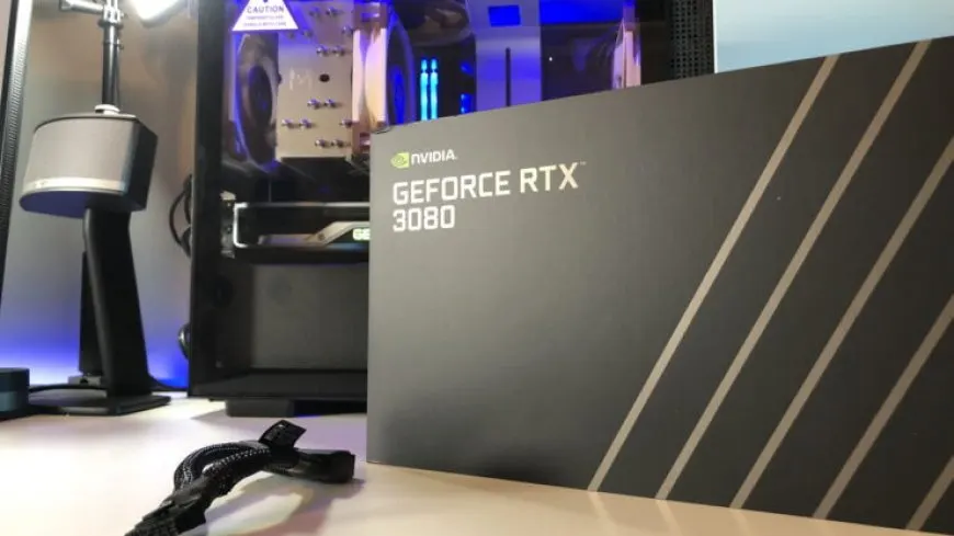 NVIDIA GeForce RTX 3080 Founders Edition graphics card unboxing showing the retail packaging and included accessories.