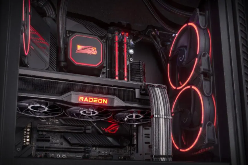 The AMD Radeon RX 6950 XT reference graphics card is installed in a Falcon Northwest TIKI mini PC.
