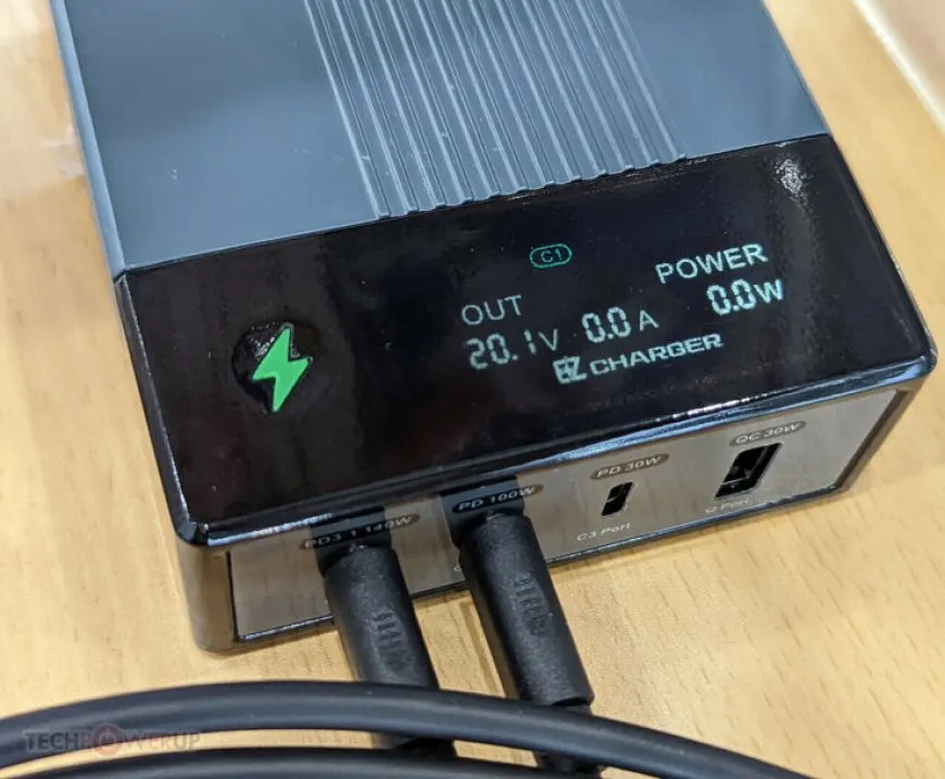 A compact 340 watt GaN laptop charger manufactured by Wii Power.