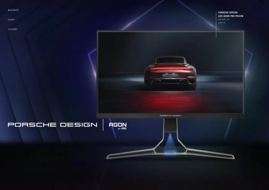 The AOC AGON PRO PD32M monitor displays a 32-inch screen with a Porsche design and Mini-LED panel.