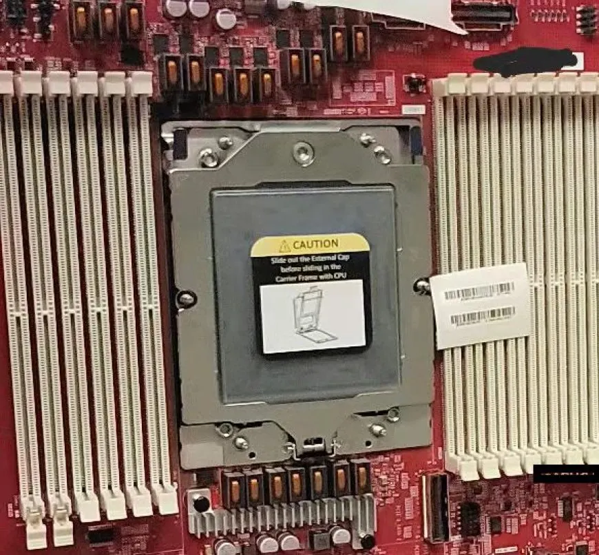 The photograph shows the AMD SP5 socket designed for future LGA 6096 EPYC processors with 96 or more cores.