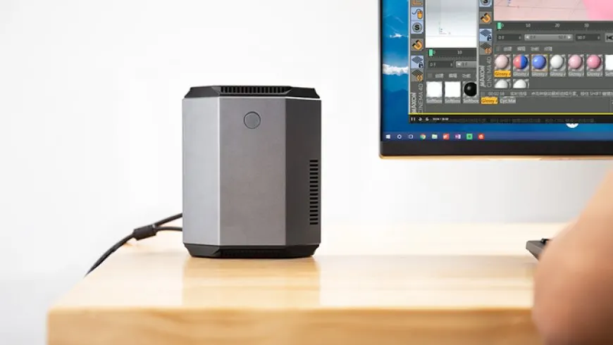 The device is a compact HaxMini computer powered by Intel Kaby Lake-G processing and housed in a speaker-sized chassis.