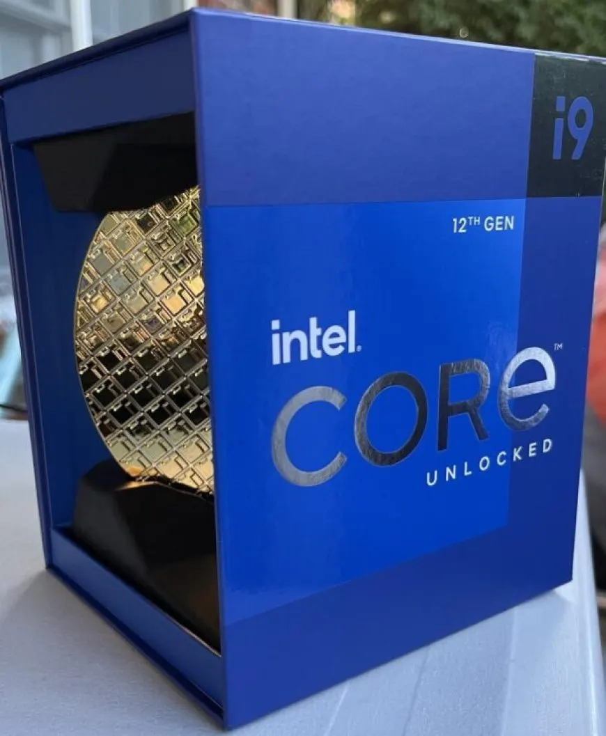 The Intel Core i9-12900K Alder Lake processor chip features engraved branding and contact pads.