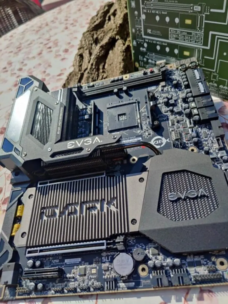 The EVGA X570 DARK motherboard displays its AM4 socket and power delivery circuitry.