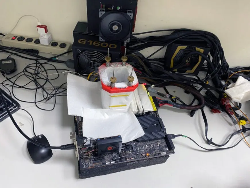 The photograph shows an AMD Ryzen 3 5300G processor mounted on a motherboard.