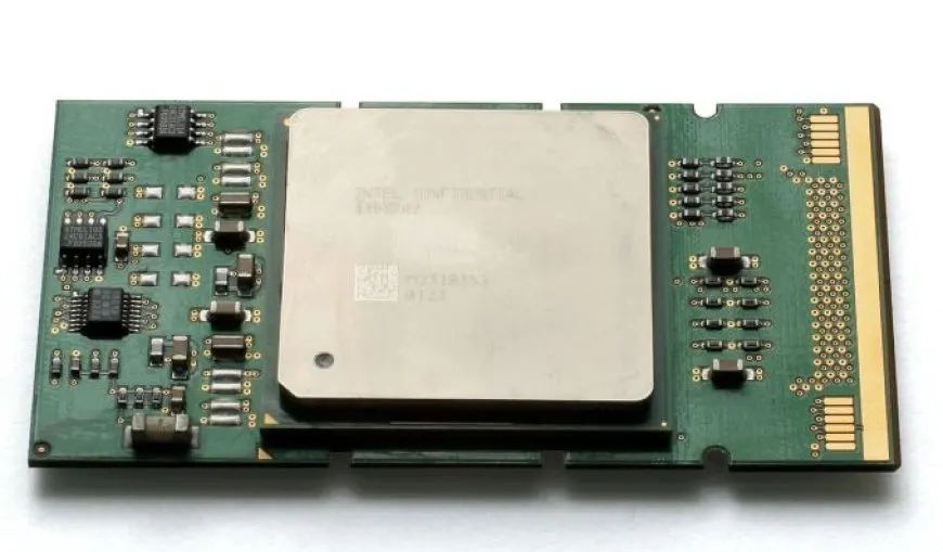 The image displays a close-up view of an Intel Itanium 64-bit processor chip.