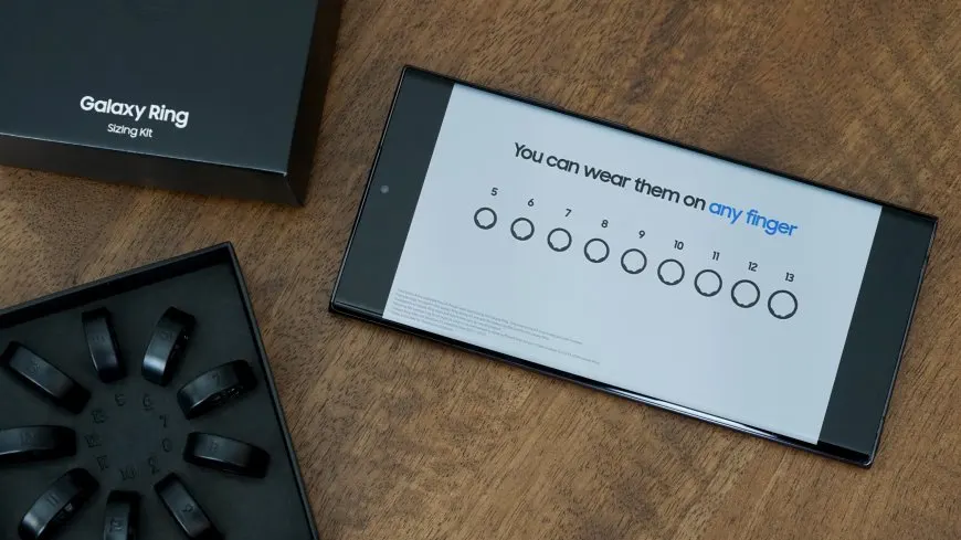 The Samsung Galaxy Ring is shown next to a sizing chart to illustrate expanded finger size options.