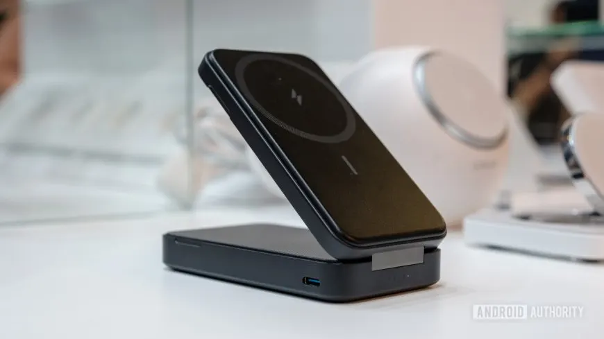 A consumer verifies a power bank model number against Anker's official fire safety recall list.