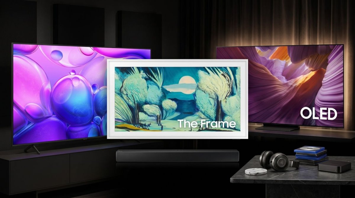 A retail display of televisions features Memorial Day promotional price tags.