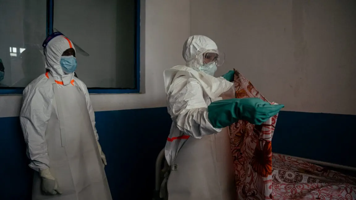 Healthcare workers in protective gear respond to an Ebola outbreak in the Democratic Republic of the Congo.