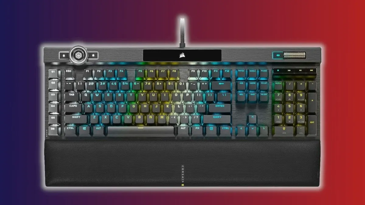 The Corsair K100 RGB gaming keyboard features OPX optical-mechanical switches and a customizable control wheel.