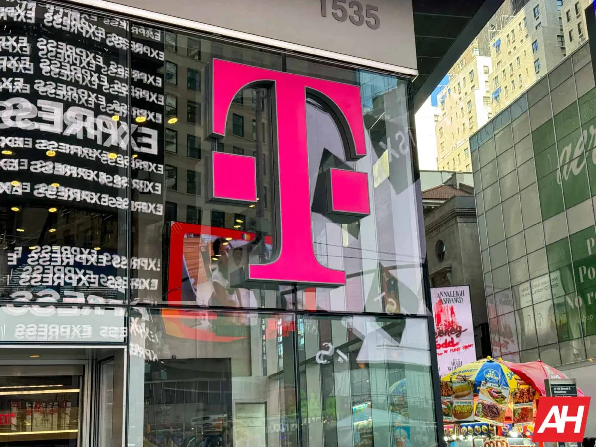 T-Mobile T-Life mandate policy document displayed on a desk
