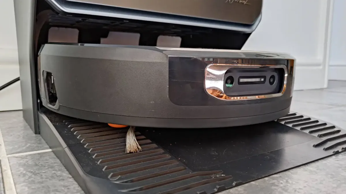 The Narwal Flow 2 robot vacuum and mop rests on a tiled floor.