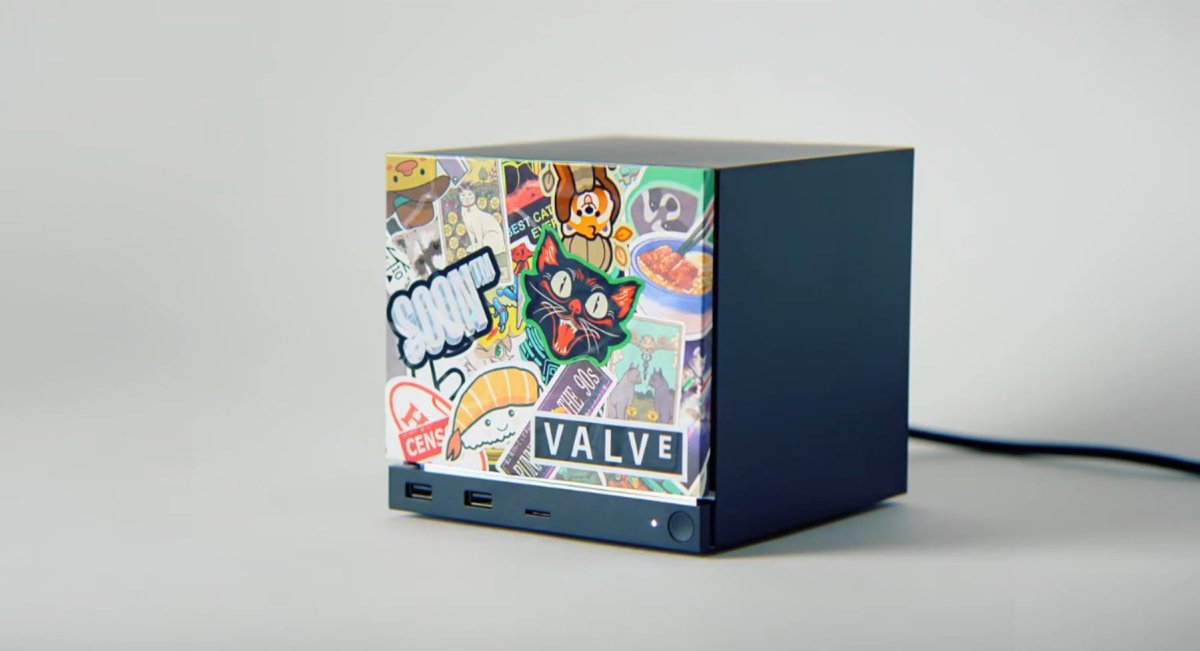 A handheld gaming console sits next to a chart tracking rising hardware prices.