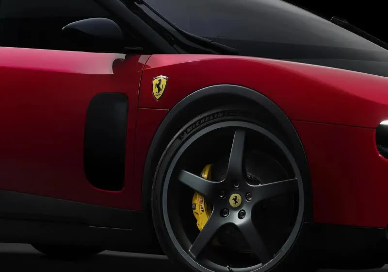 A Ferrari electric vehicle designed by Jony Ive faces criticism for departing from traditional styling.