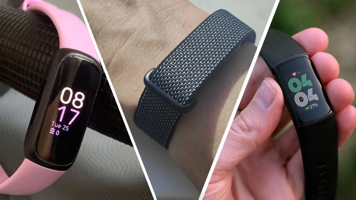 Fitbit fitness trackers and smartwatches are arranged on a display table.