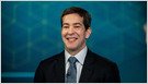Okta stock chart and Q1 earnings data showing revenue beat and after-hours price jump