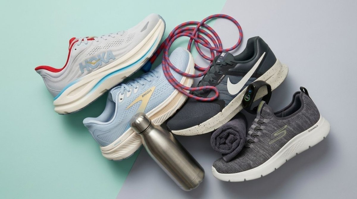 A display of running shoes is arranged for a seasonal retail promotion.