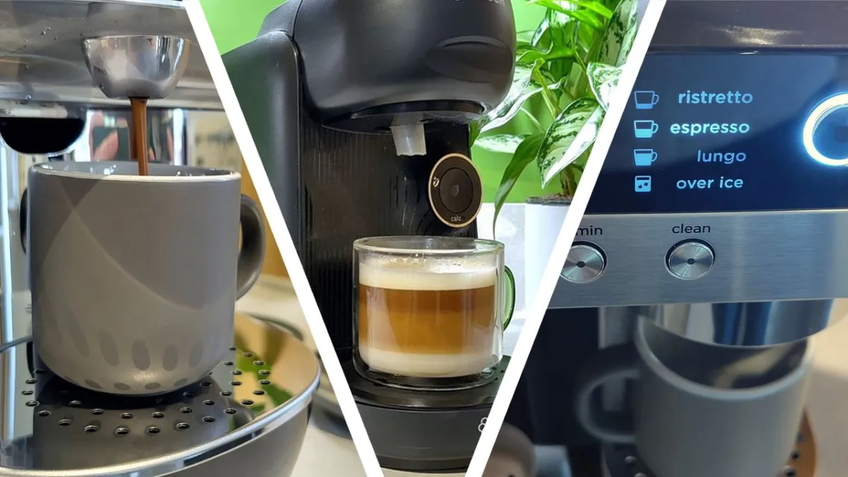 A capsule coffee machine brews a cup of coffee beside a stack of aluminum pods.