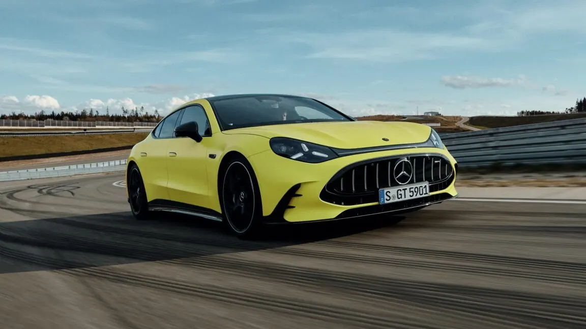 The all-electric Mercedes-AMG GT four-door is displayed from a side angle, showing its exterior profile.