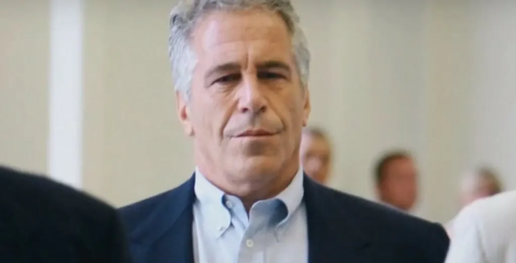 Police officers review documents related to historical abuse allegations from the Epstein files.