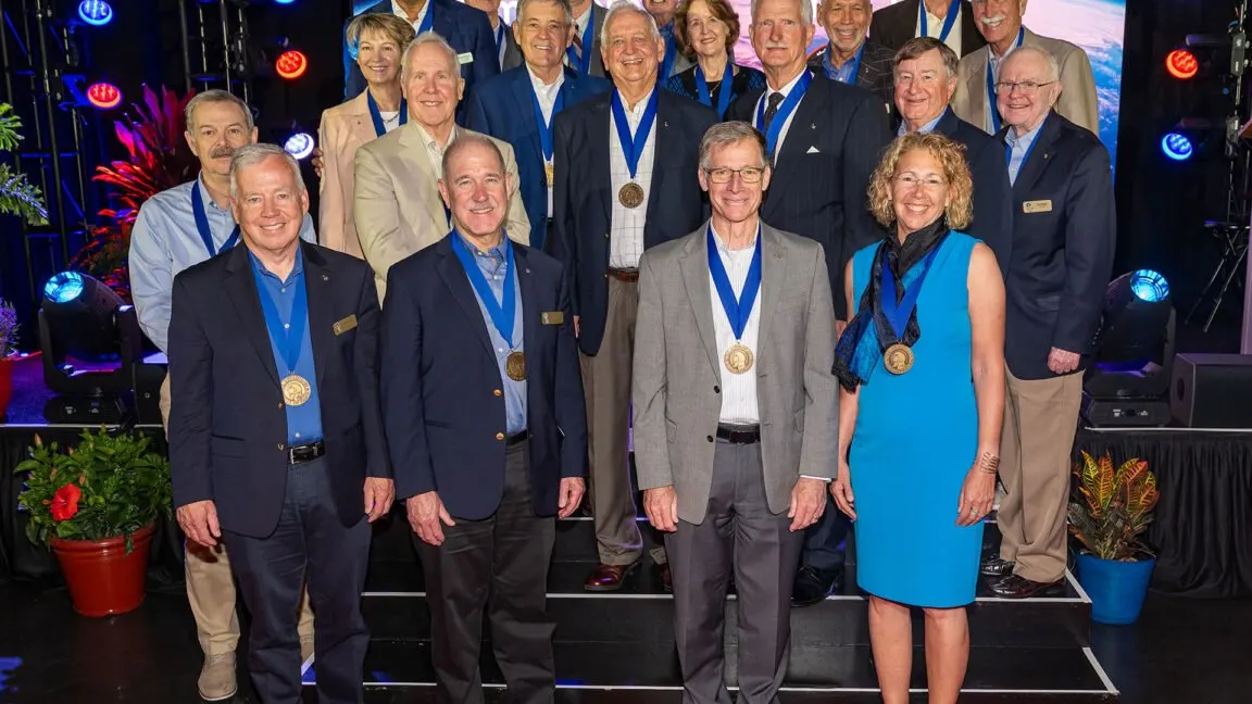 Two shuttle-era spacewalkers are inducted into the Astronaut Hall of Fame.