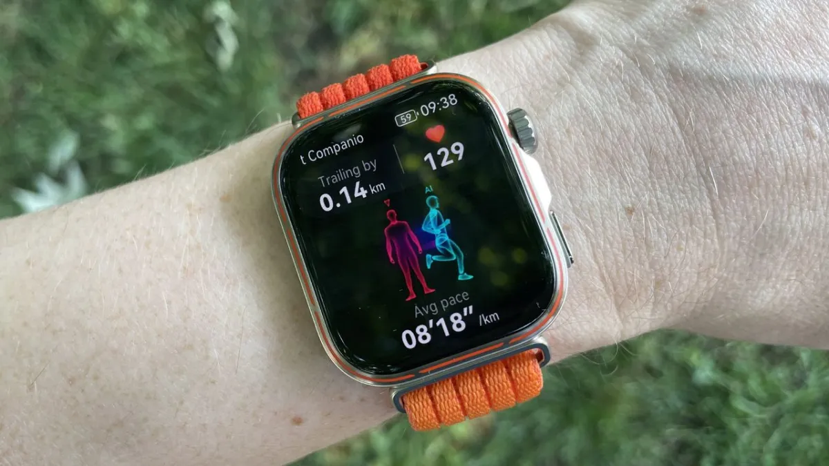 The Huawei Watch Fit 5 Pro smartwatch is displayed on a wrist with its screen illuminated.