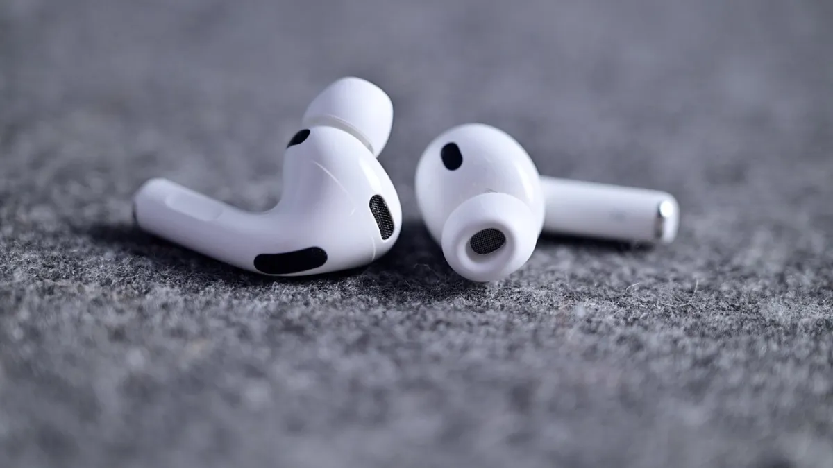 The iOS 27 settings menu displays a redesigned interface for managing AirPods audio controls.