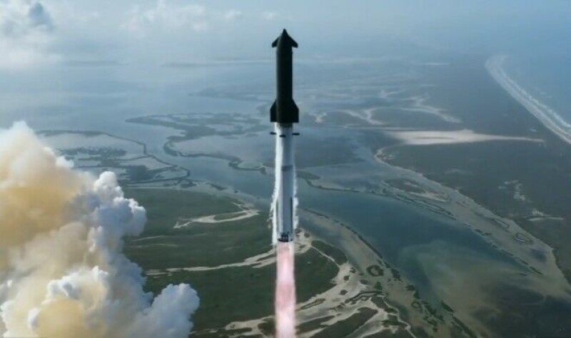 The SpaceX Starship rocket stands on the launchpad.