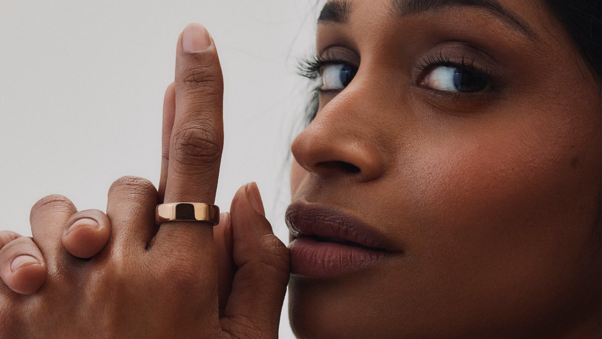 A close-up of the Oura Ring 5 showing its reduced size and upgraded sensor array.