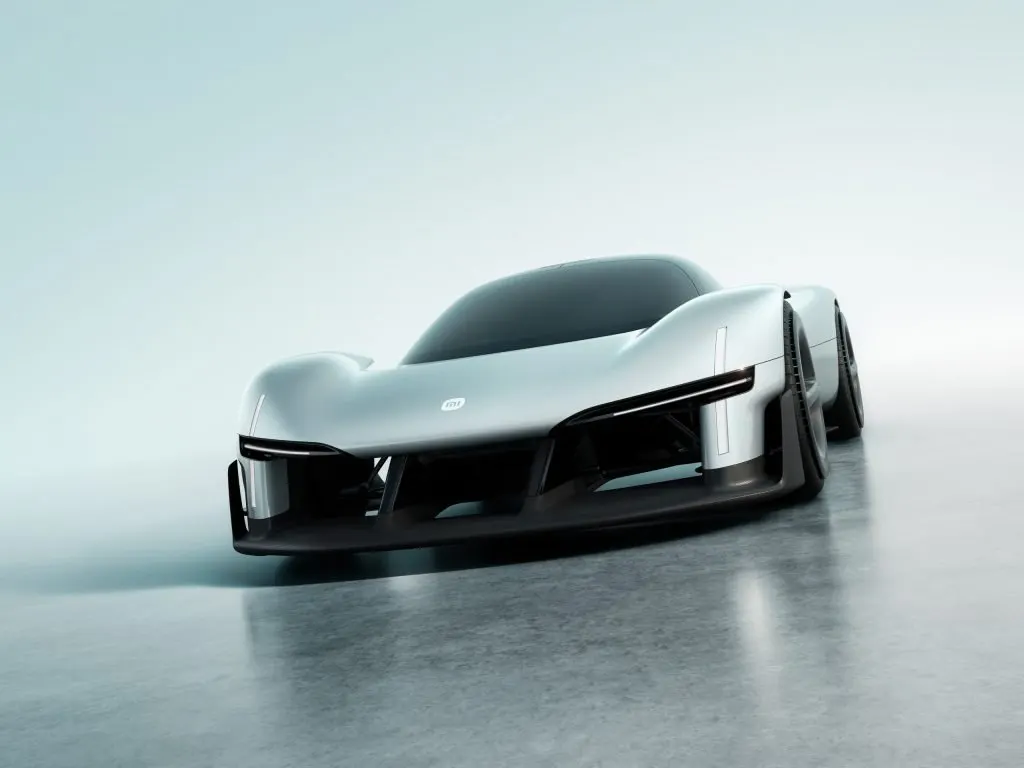 The Xiaomi Vision GT two-door concept car is displayed with its aerodynamic design and connectivity features visible.