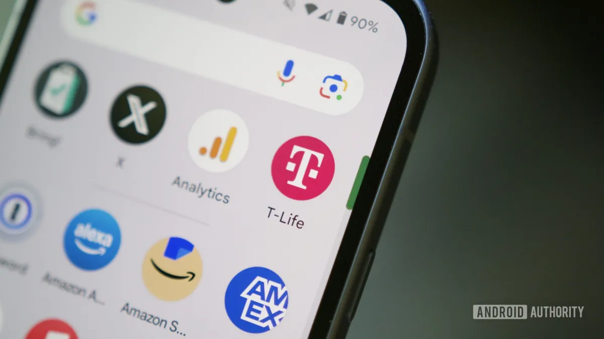 Customer using a smartphone app at a T-Mobile retail store counter