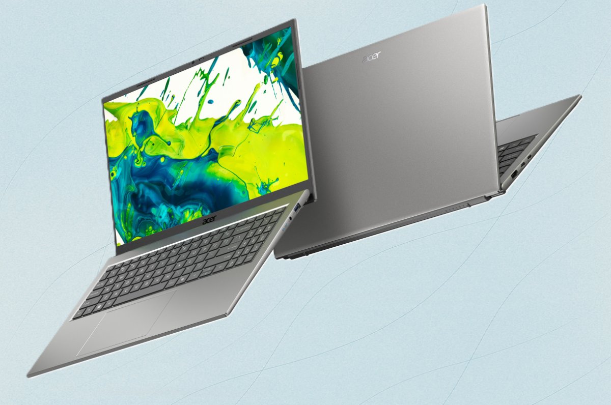 Budget Windows laptops are arranged on a desk to showcase their compact designs and efficient hardware.