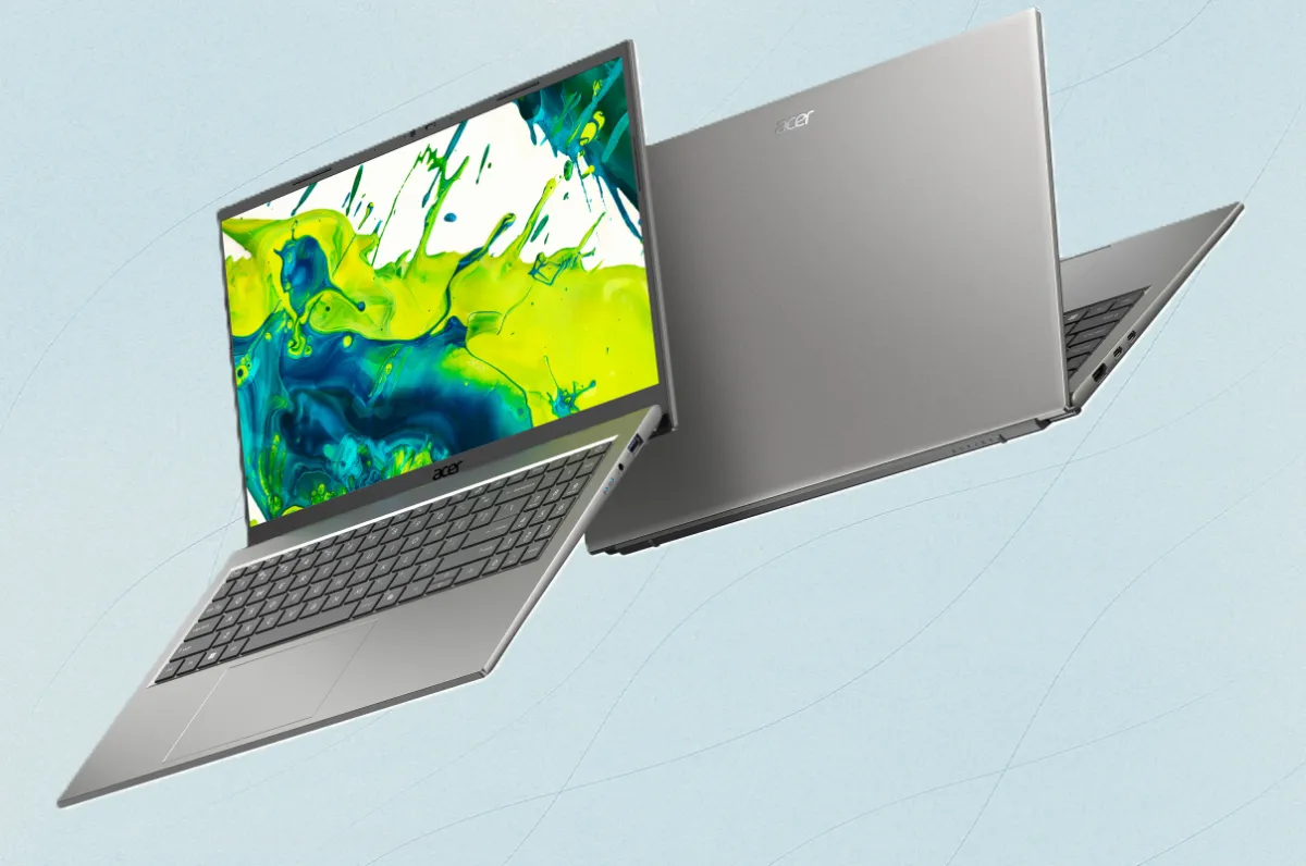 Budget Windows laptops are arranged on a desk to showcase their compact designs and efficient hardware.