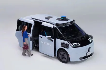 A Waymo Ojai sixth-generation robotaxi features a lounge-style interior and advanced autonomous driving equipment.