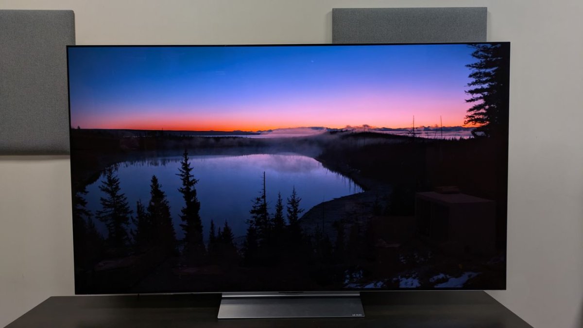 The photograph displays the LG Electronics corporate logo and a television screen.