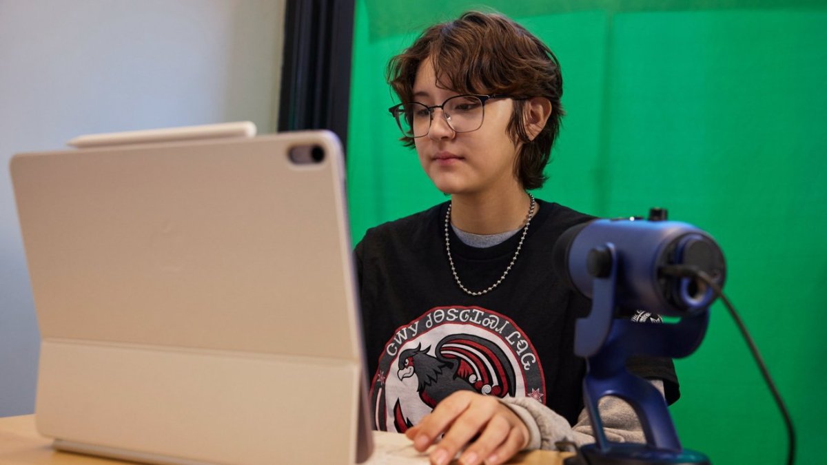 Students and teachers using iPads and Macs to practice Cherokee language at an Oklahoma immersion school.