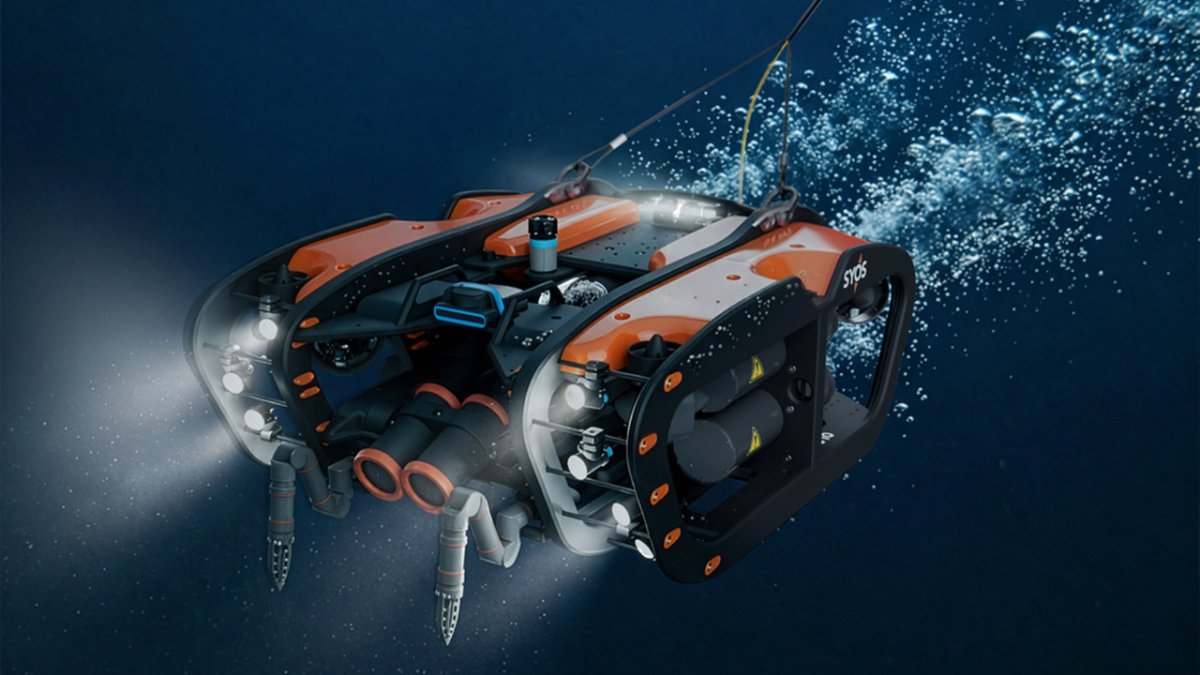 SU10 autonomous underwater drone positioned near an undersea cable during a monitoring operation.