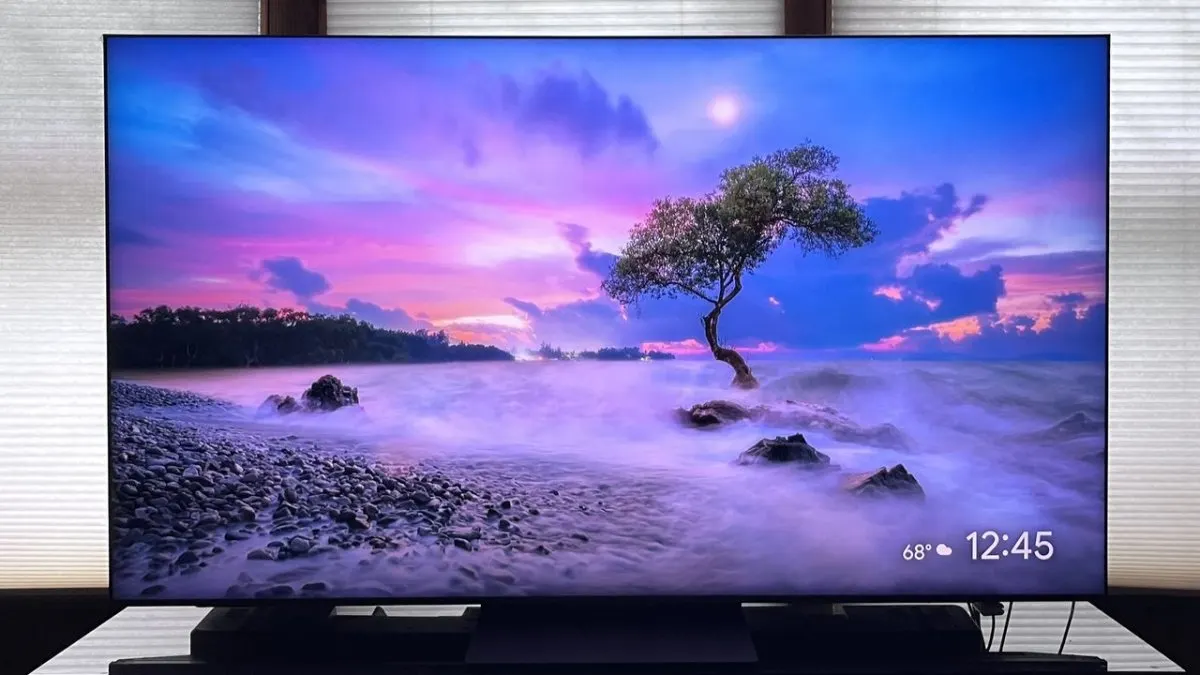 TCL Google TV interface showing system settings for firmware updates and Dolby Vision audio configurations