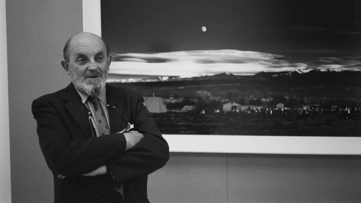 The display features an unauthorized AI colorized adaptation of an Ansel Adams landscape photograph.