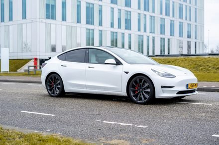 A Tesla dashboard displays real time sensor data and navigation maps during an autonomous driving test.