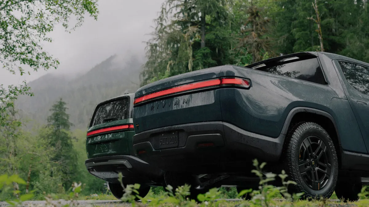 The Rivian dashboard displays the AI voice assistant interface for cabin control.