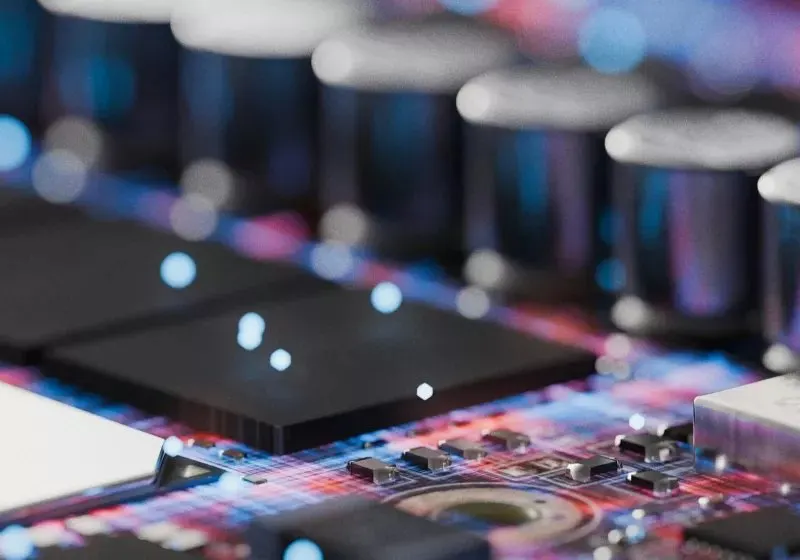 Imec unveils a 3D NAND-DRAM hybrid memory chip combining DRAM speed with NAND flash density.
