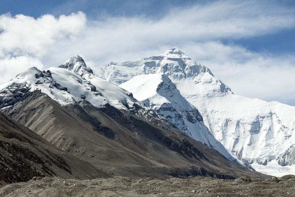 American climber Tyler Andrews summits Mount Everest in nine hours and fifty-five minutes, breaking the speed record.