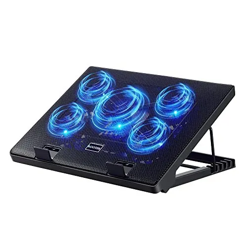 A laptop rests on a cooling pad equipped with dual fans and visible airflow vents.