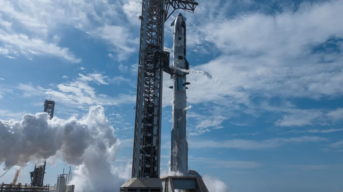 The Starship V3 rocket stands on the launch pad before its debut flight to test Raptor 3 engines and heat shield performance